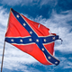 Illustration for article titled Contractor Shows Up at Black Couple’s House With Confederate Flag, Shockingly Gets Fired: ‘I Didn’t Know the Flag Offended, Y’all’